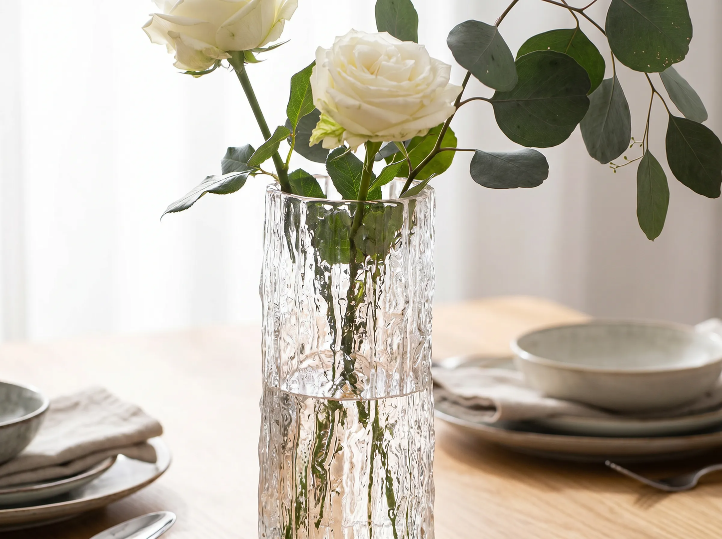 Modern Glass Hydroponic Vase close-up with flowers